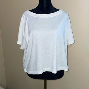 Raisin’s white T-shirt. Size medium . Super cute and comfy. Made in the USA